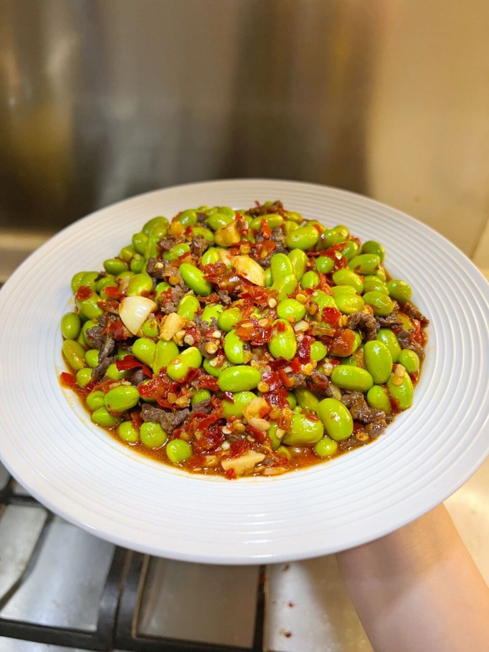 香香辣辣,特别入味[赞同][赞同] 92食材:毛豆,牛肉,蒜,小米辣,干