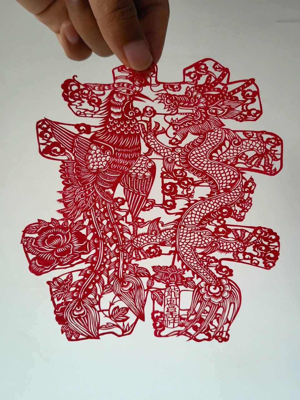精品剪纸小作 龙凤呈祥剪纸双喜～龙凤呈祥是一种寓意吉祥如意的传统