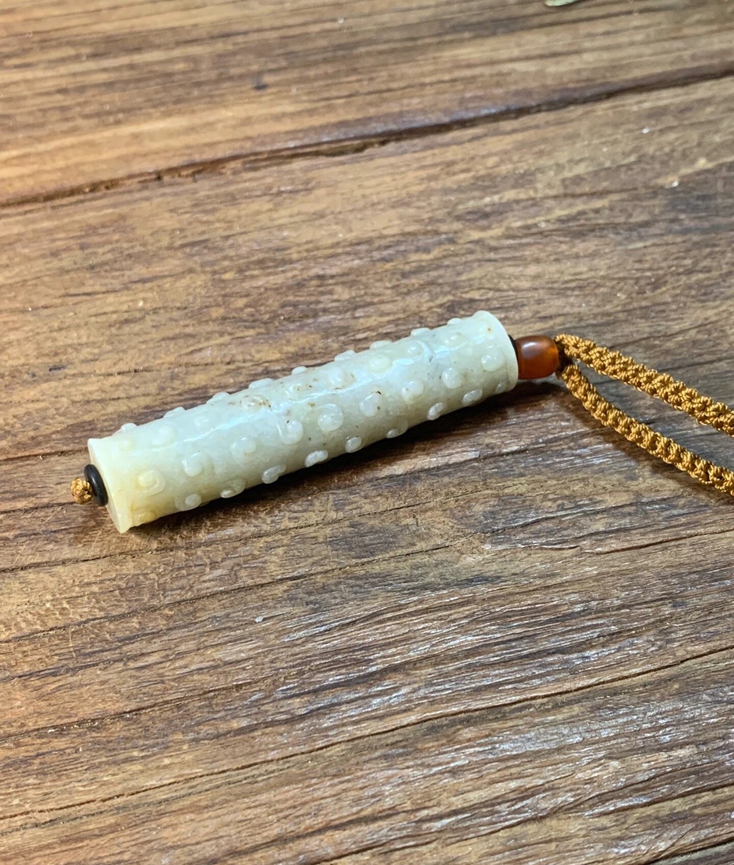 战国谷纹玉勒子 战国和田白玉谷纹玉勒子 谷纹玉勒,和田白玉质,器形