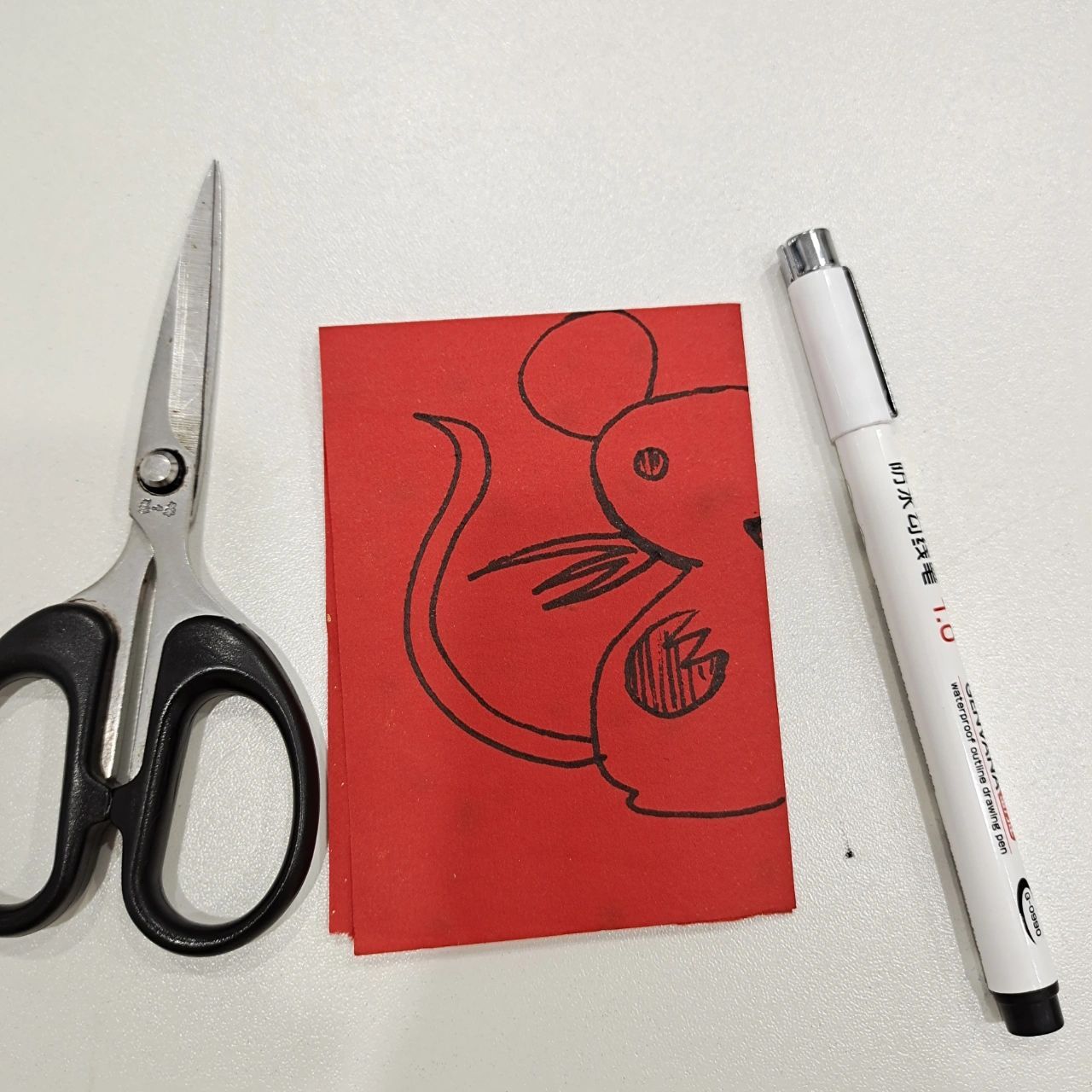 超简单12生肖剪纸3分钟搞定一只老鼠 方法还是那个方法哦!