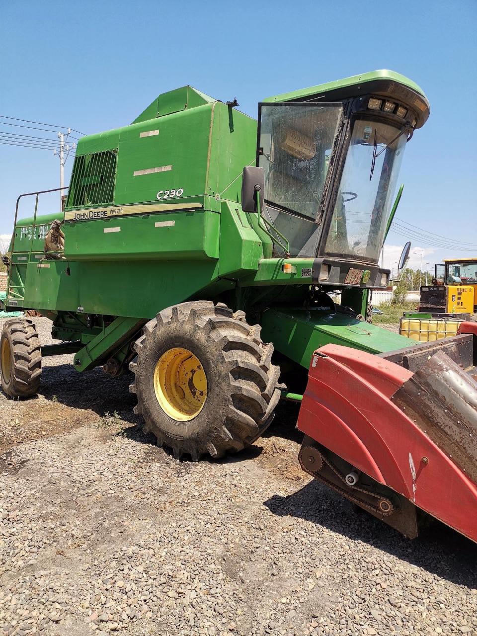 14年迪尔c230收割机,带两个割台