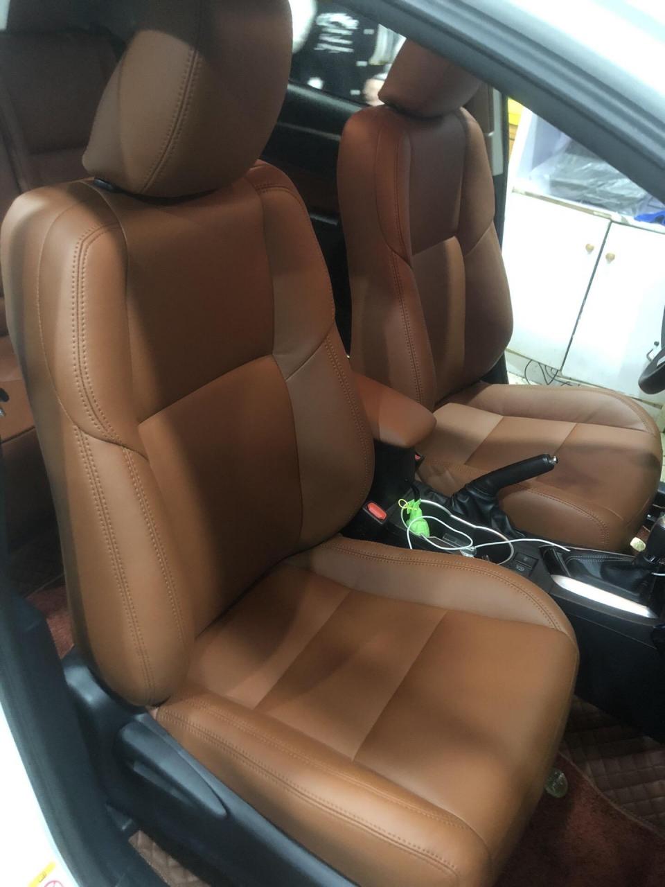 丰田雷凌   原车布织更换  真皮座椅,门板升级卡宴棕色
