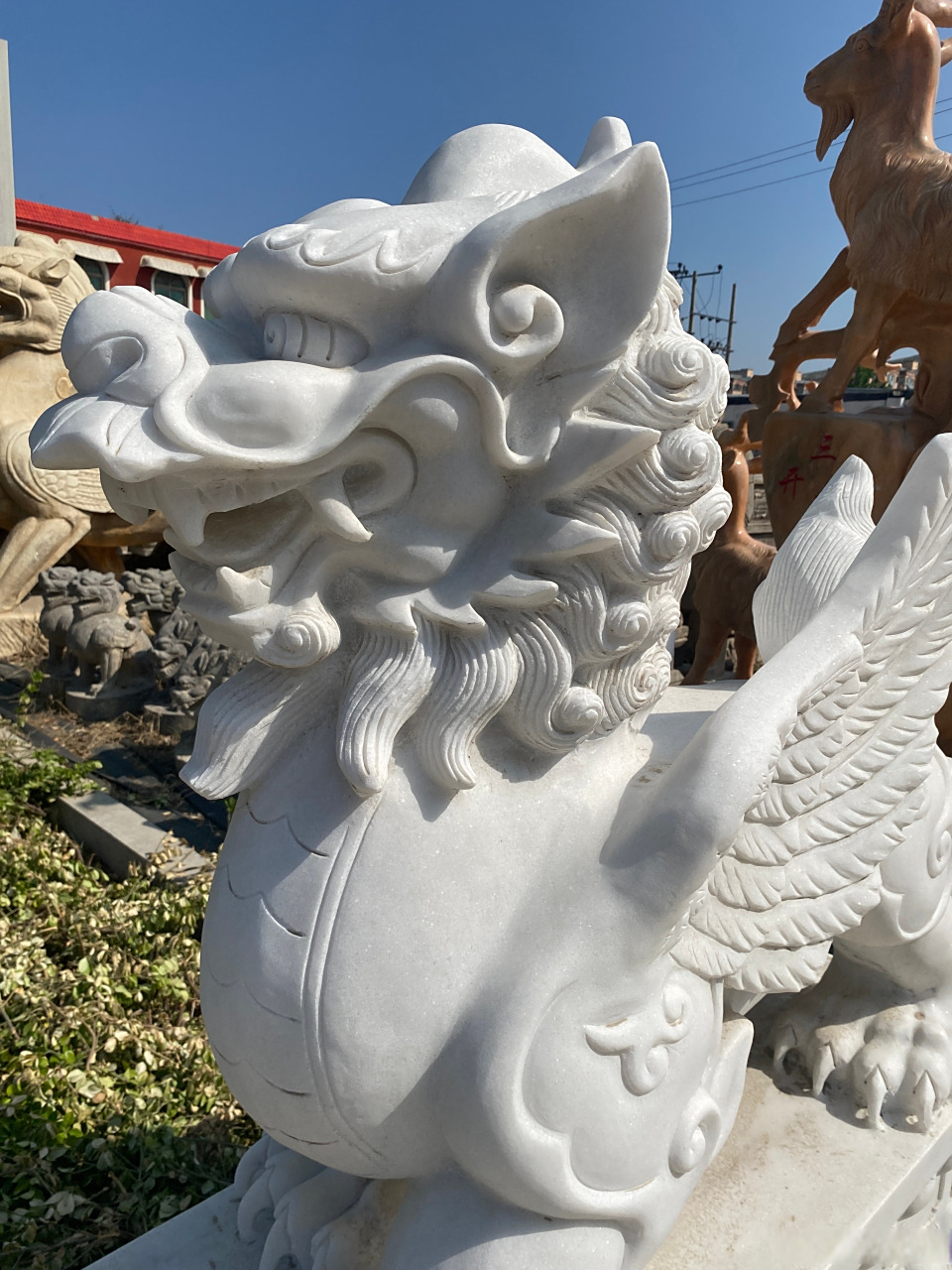 石雕麒麟公母一对汉白玉青石天然石麒麟别墅庭院酒店家用门口摆件石雕