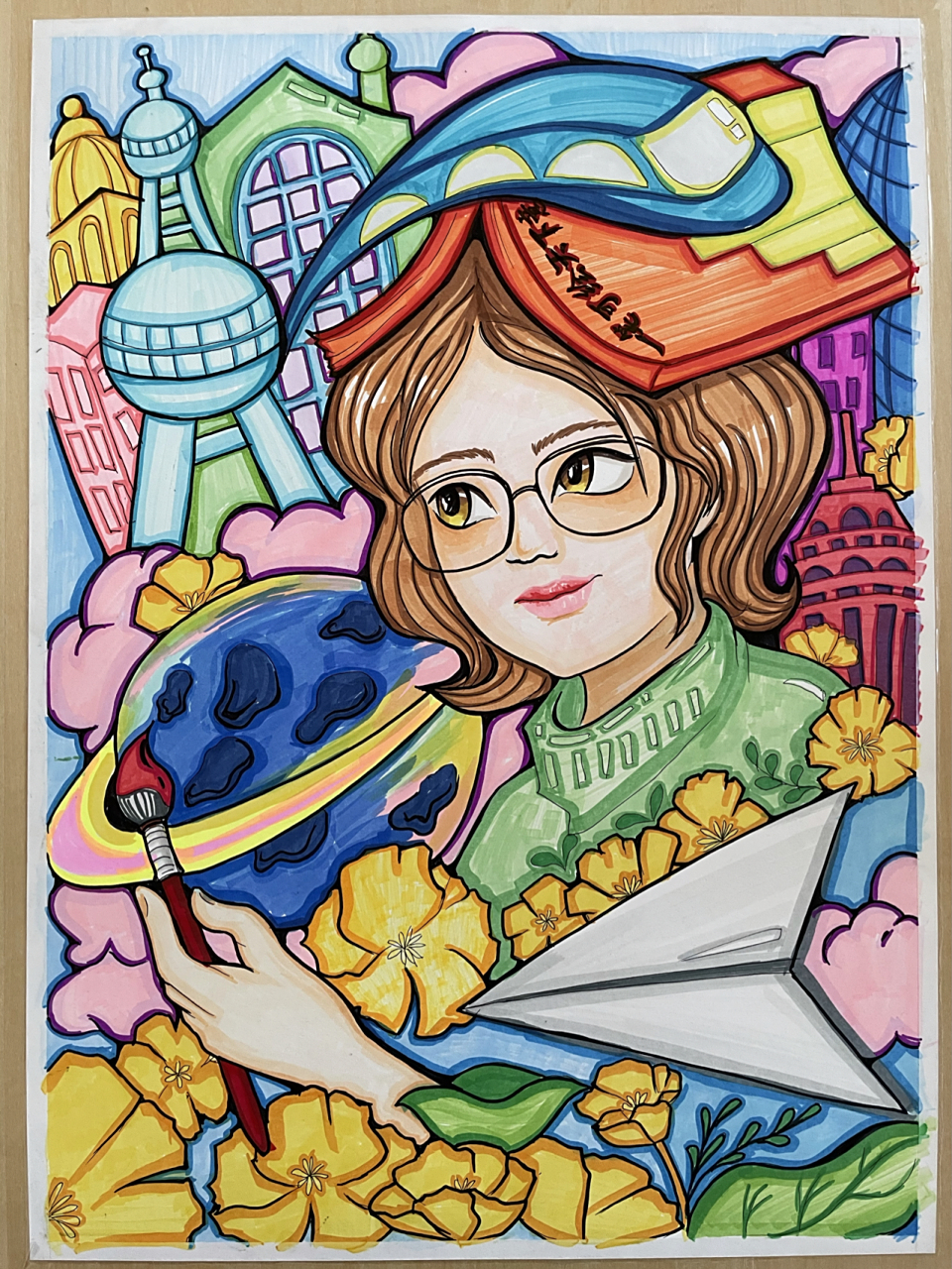 "我的梦想"主题马克笔示范画 一支画笔闯世界的梦想为构图思路,结合