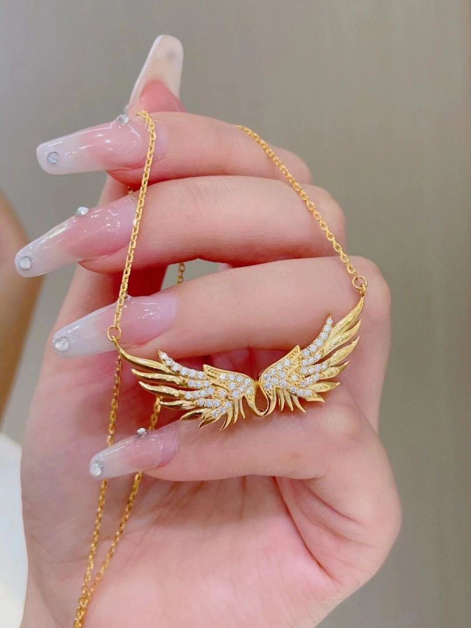 5g足金新品镶嵌款项链～ 天使的翅膀9899 金重:10