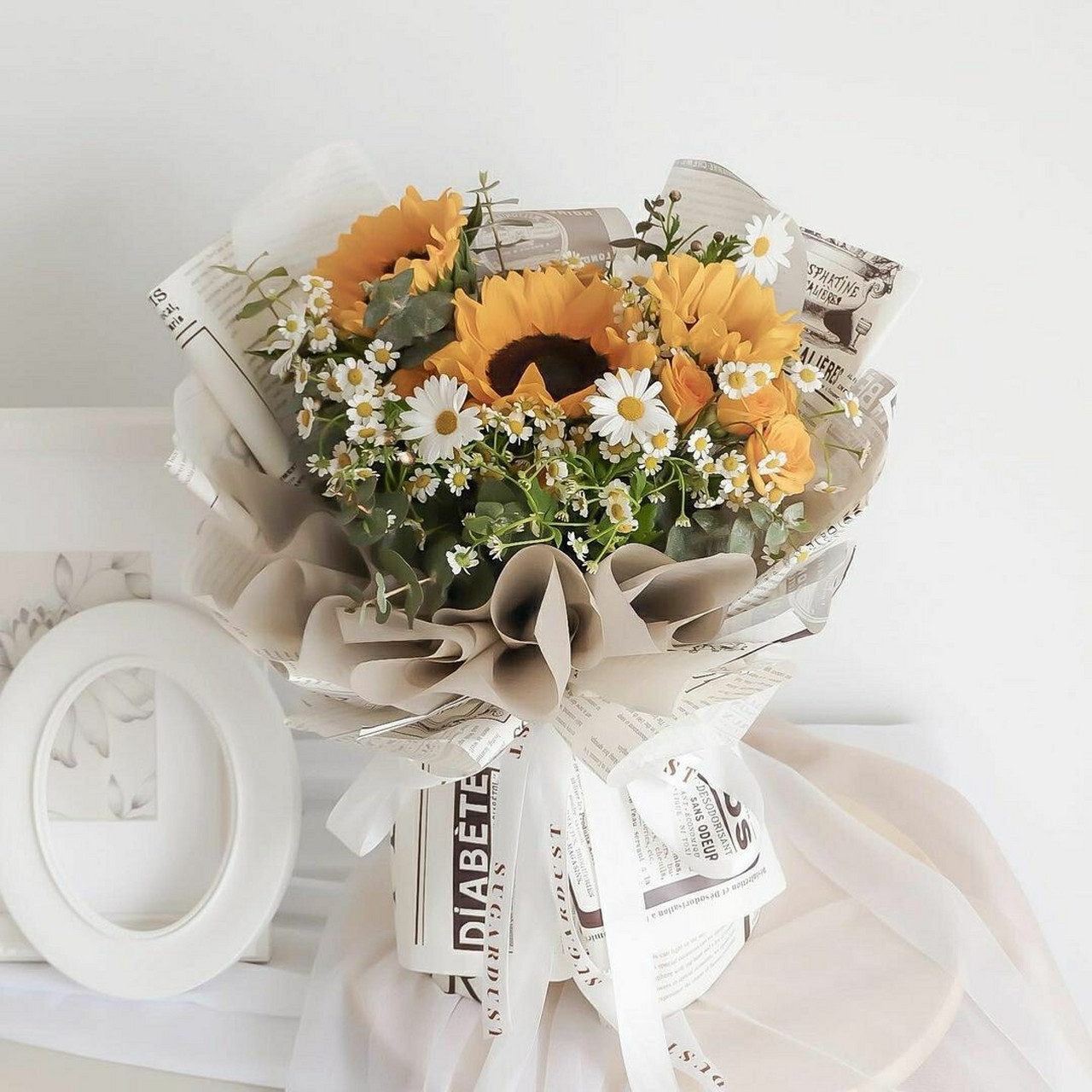 向日葵洋甘菊清新花束搭配 花之海岸鲜花速递9994 大家好,今天给