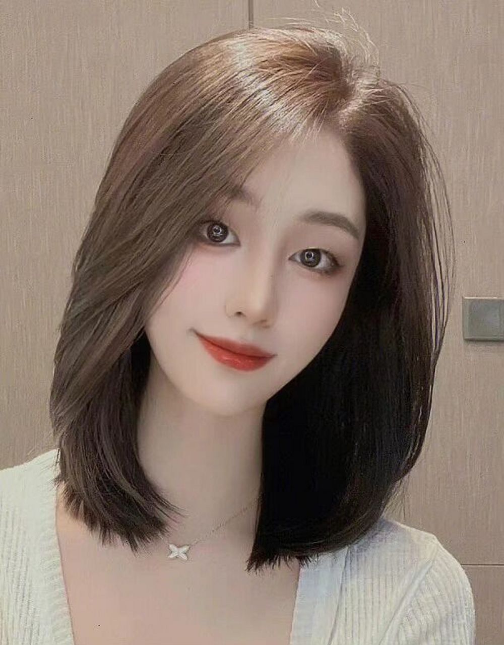 可修饰高额 头太阳穴颧骨突出,脸型轮廓披扎都长度在锁骨位 置,适合