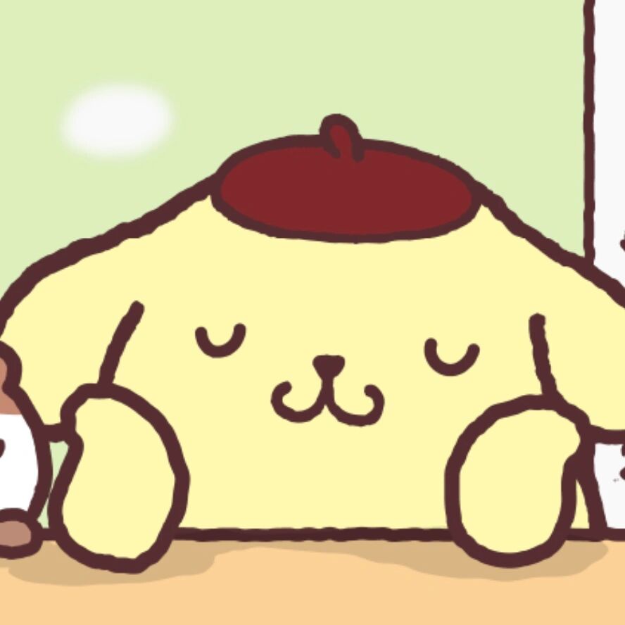 乖乖趴桌上的小玛芬和布丁狗