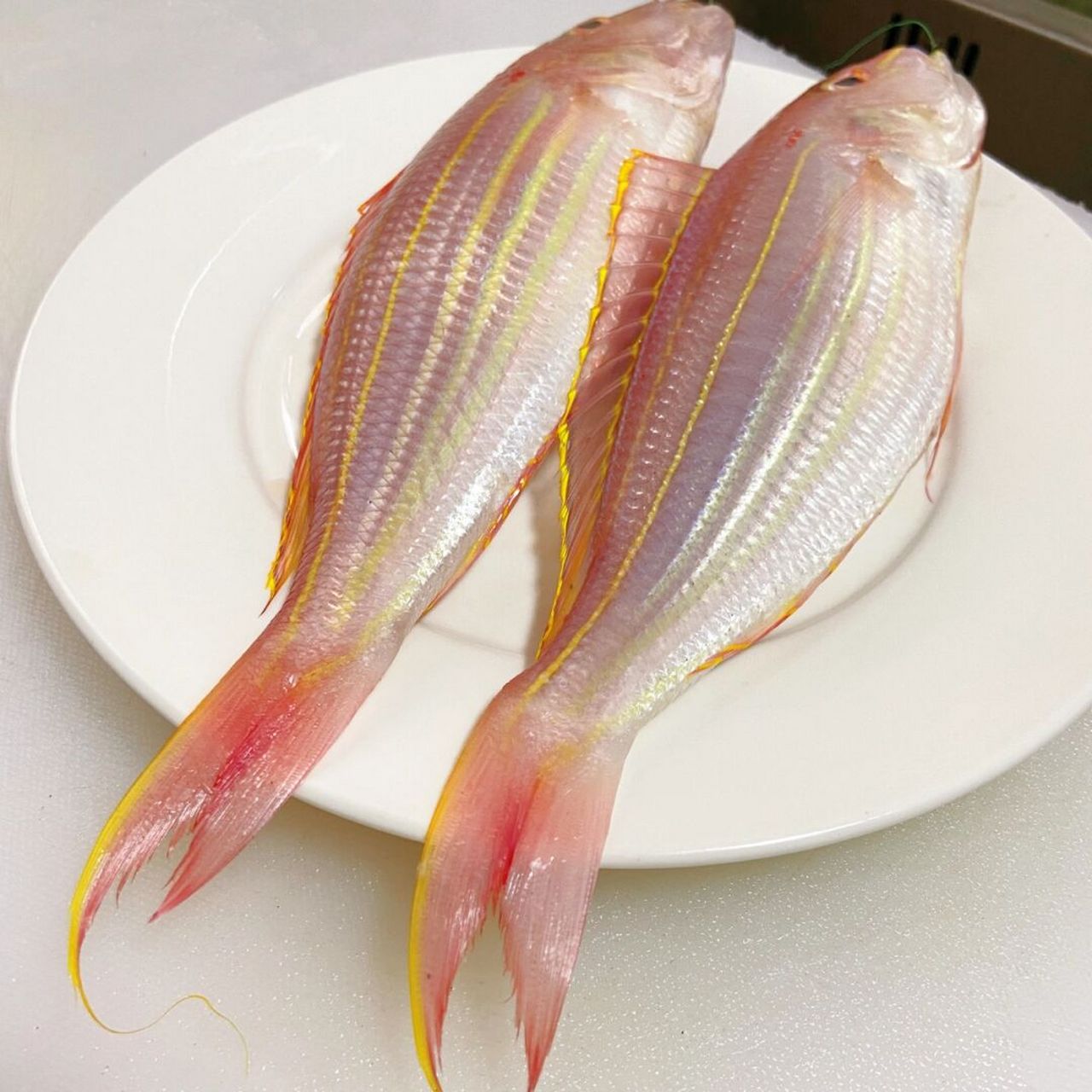 好靓的金线鱼 今天起的早,去市场看到有又大又新鲜的金线鱼,带了两条