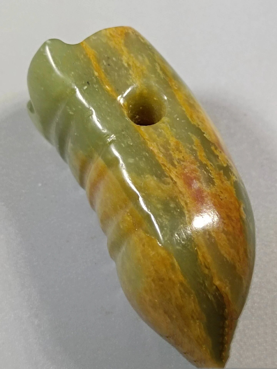 红山文化大眼玉蝉 红山文化玉蝉,呈现典型的蝉形,身体短胖,大眼圆鼓