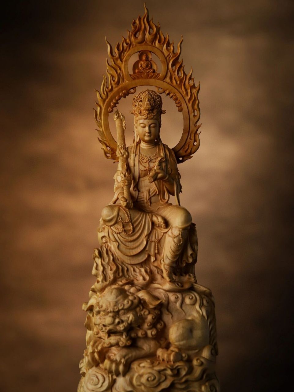 文殊菩萨:大智慧的象征 黄杨木 | 文殊菩萨 运刀得心应手,刀法变化丰