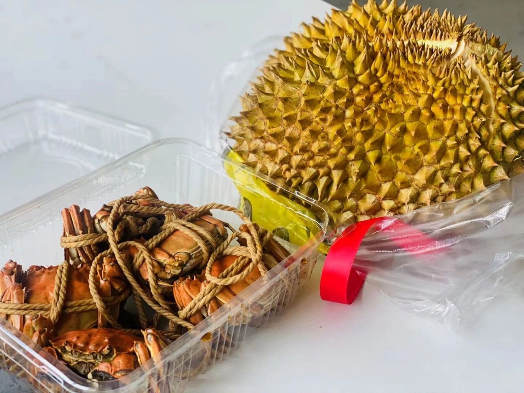 螃蟹02和榴莲可同吃吗