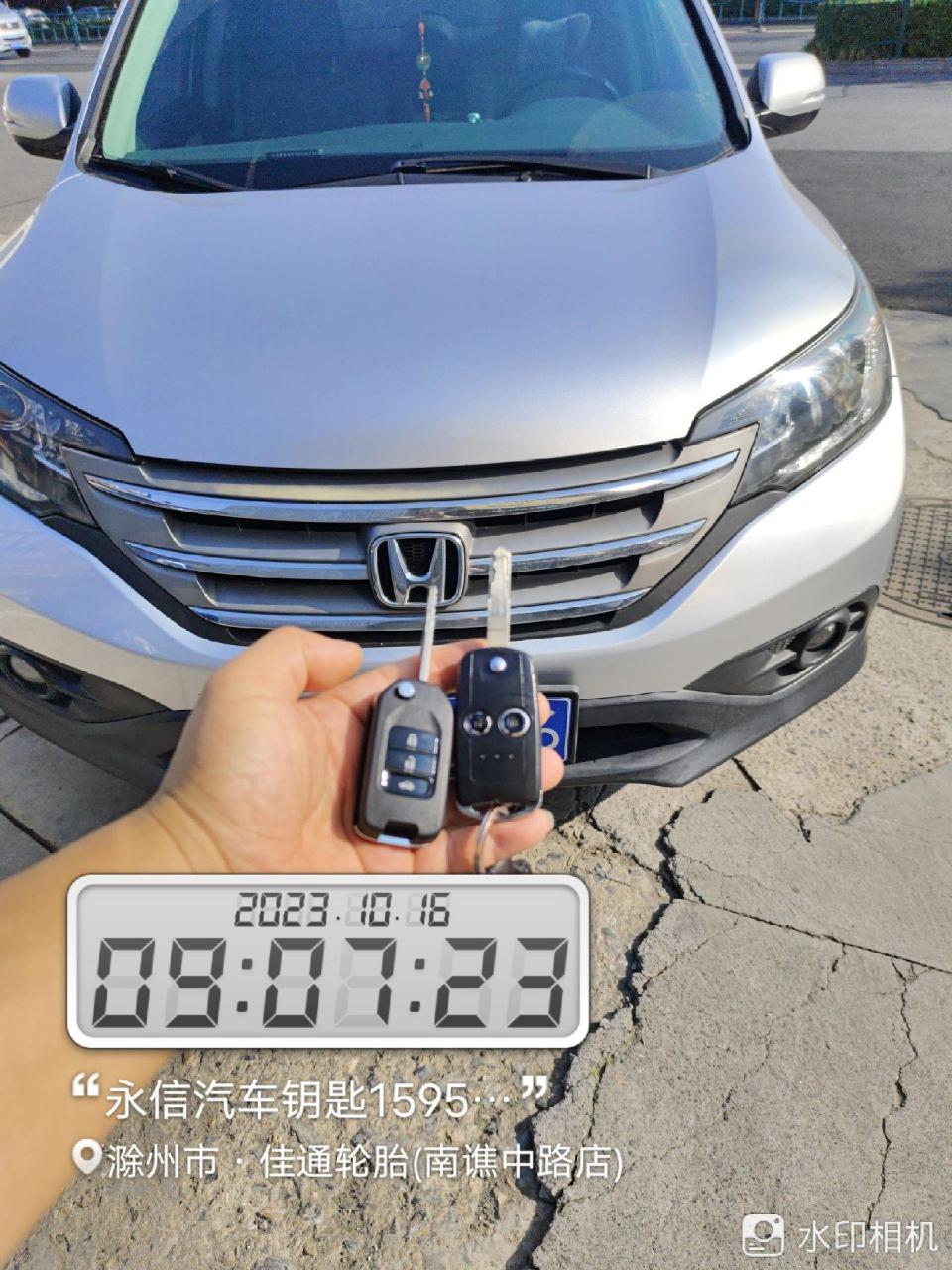 14年本田crv折叠钥匙增配一把!增加了遥控开启后备箱的功能!