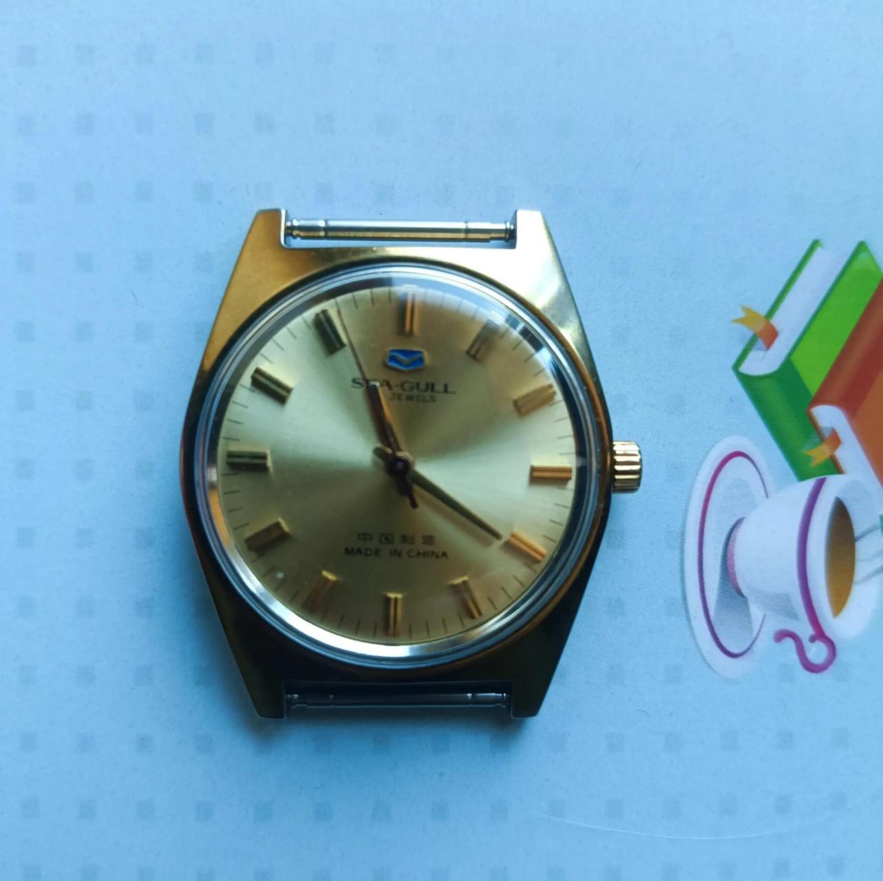 天津海鸥老手表(少有款) 又淘到一枚少见的金色蓝标老海鸥手动机械