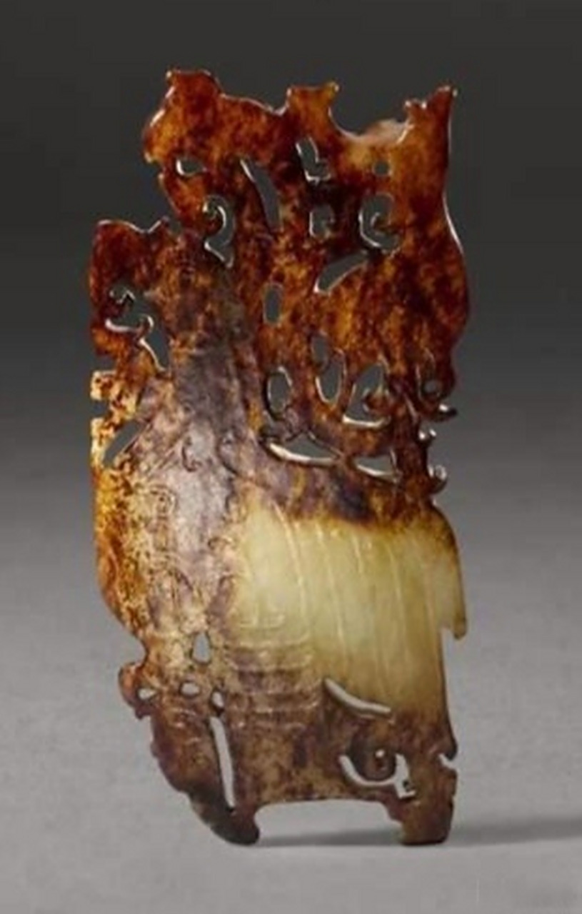 玉佩,是石家河文化血腥祭司场景的直观展现,凌家滩最多用两猪头99!