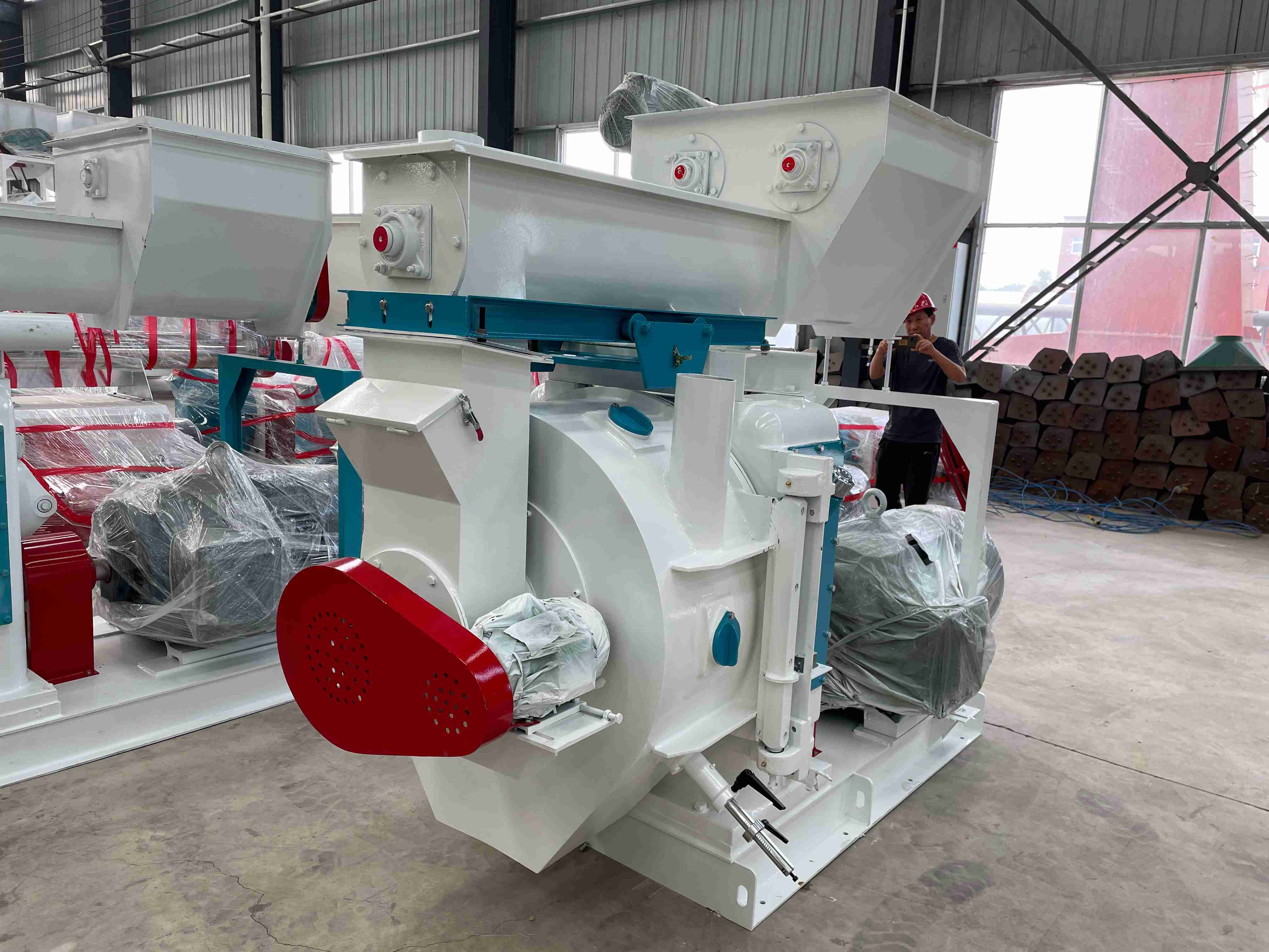 山东安益生物科技获得新式高效湿法混合制粒机专利方便把残留在转轴邻近的颗粒状软材取出