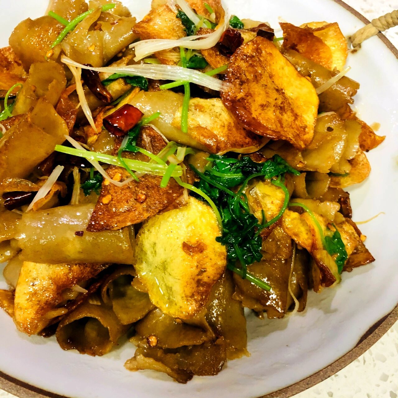 土豆片莜面栲栳栳香辣过瘾(附教程) 莜面栲栳栲是一道地道的传统风味