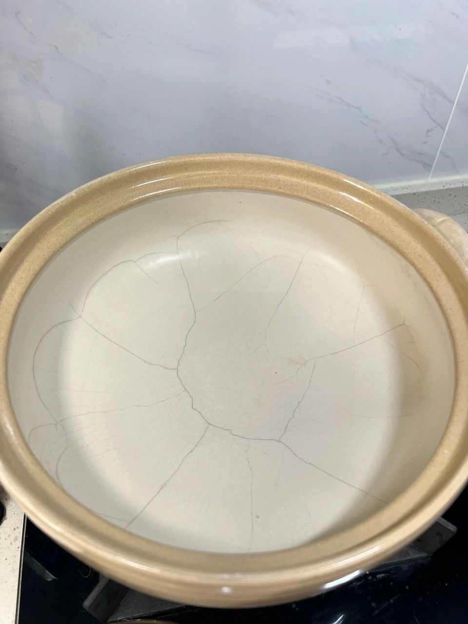 第二次就有明显裂痕了,还能继续用吗 某多多买的砂锅,摸着很重很厚实