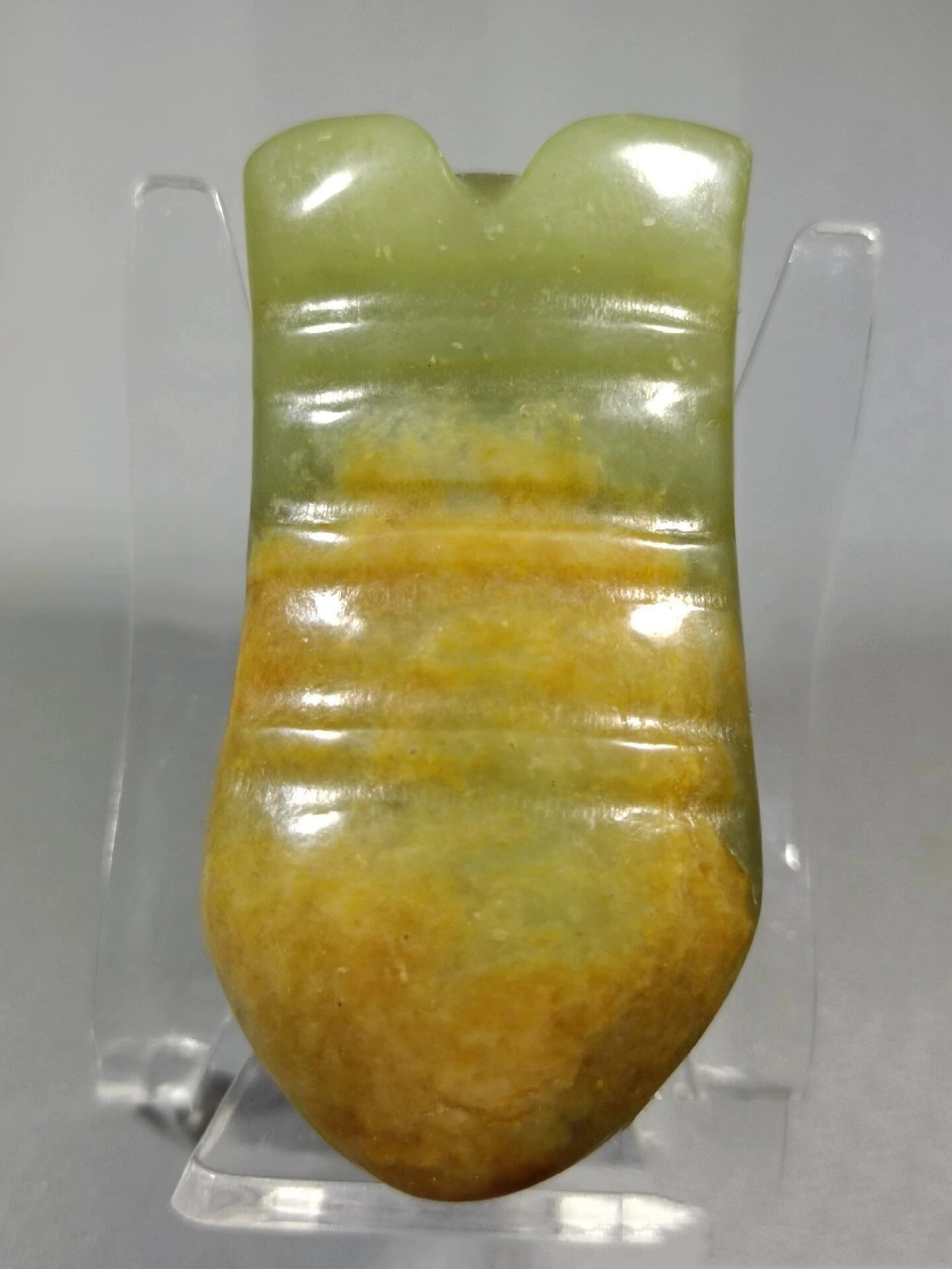 红山文化大眼玉蝉 红山文化玉蝉,呈现典型的蝉形,身体短胖,大眼圆鼓