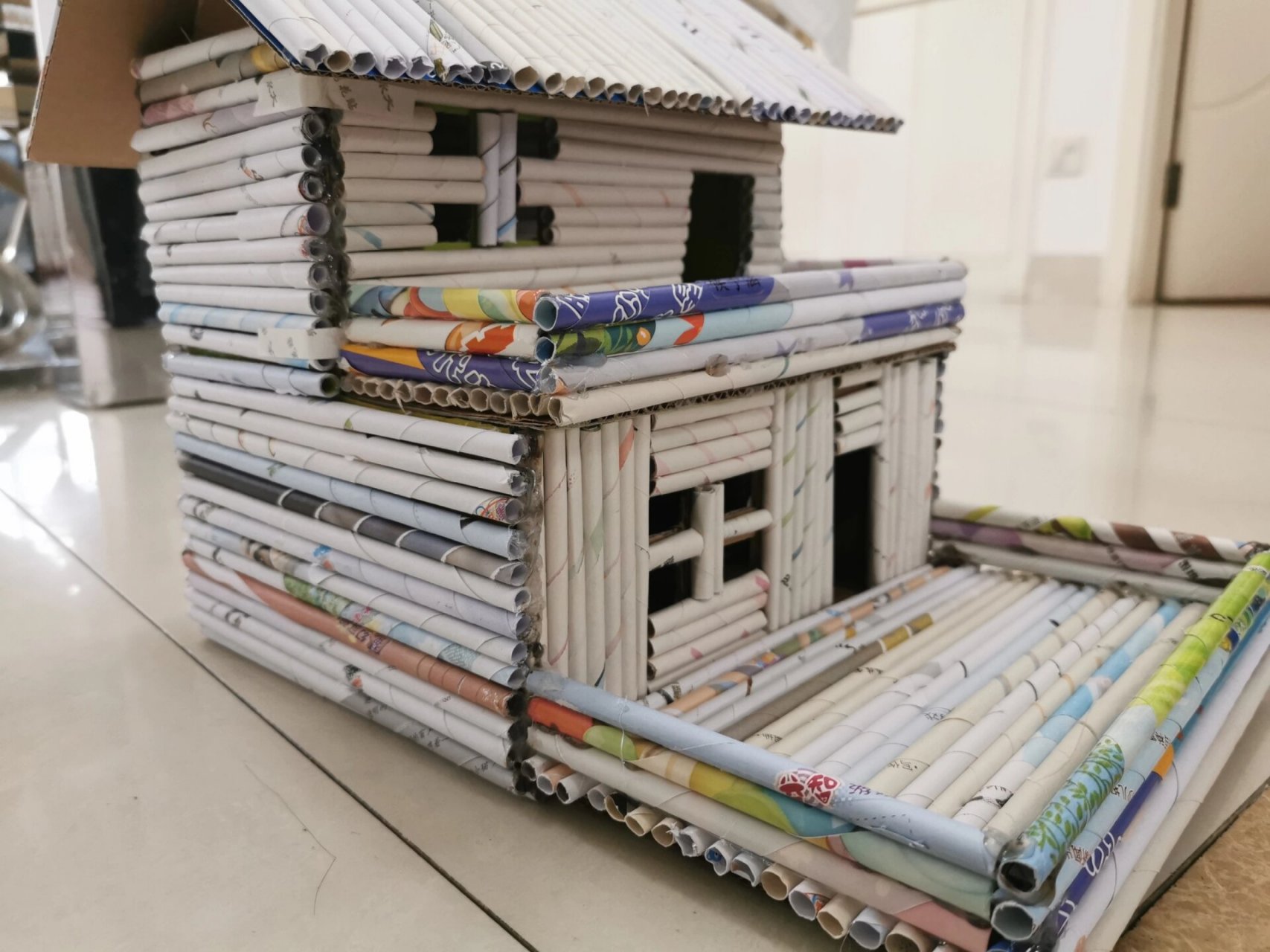 手工报纸卷棒制成的小房子 环保手工,给的启发,用废杂志卷的棒制作的