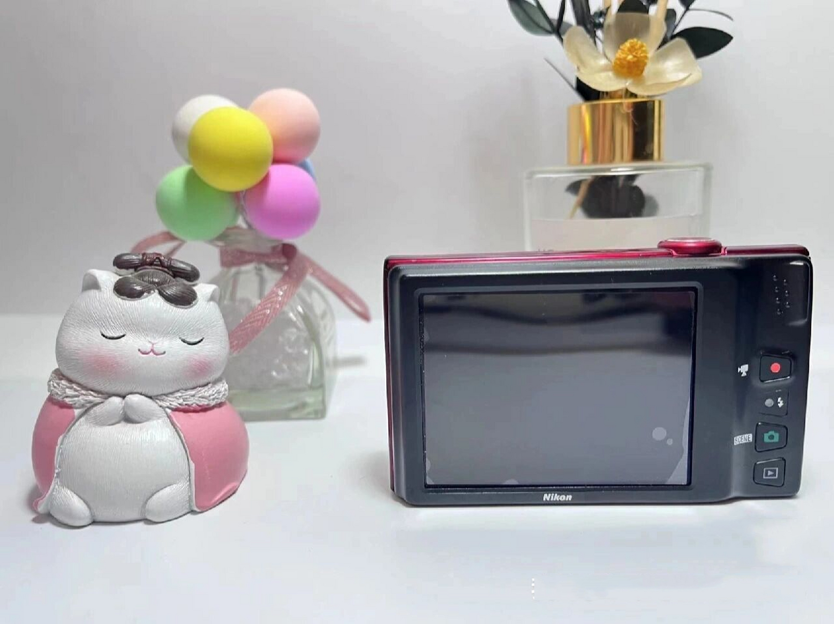 尼康s6100 尼康s6100复古可乐红,1600万像素 触屏 7倍长焦 照片可涂鸦