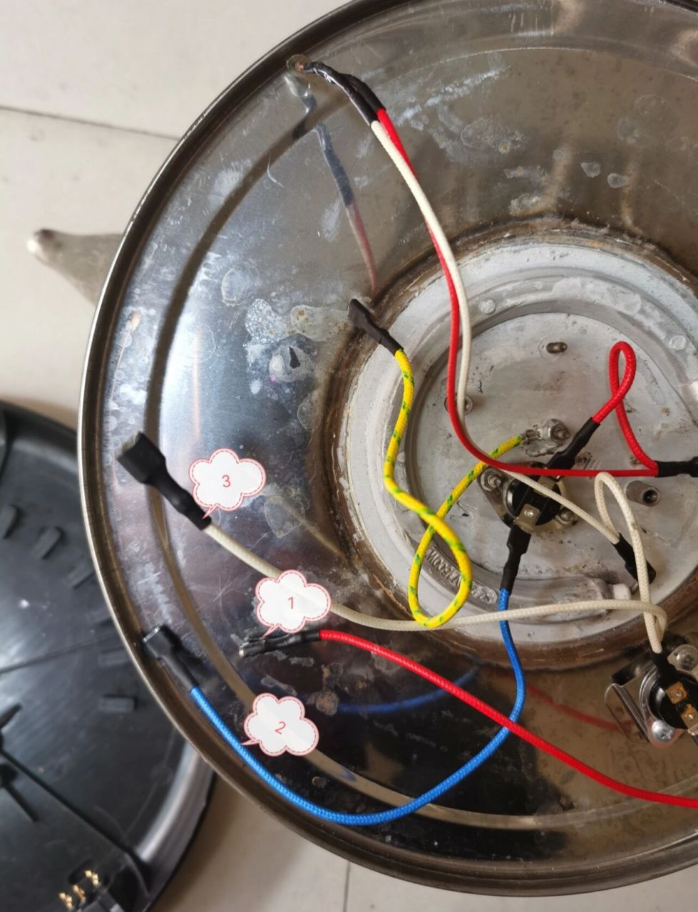 电水壶开关烧坏了,在网上买了一个开关,拆开之后就忘记怎么接线了.