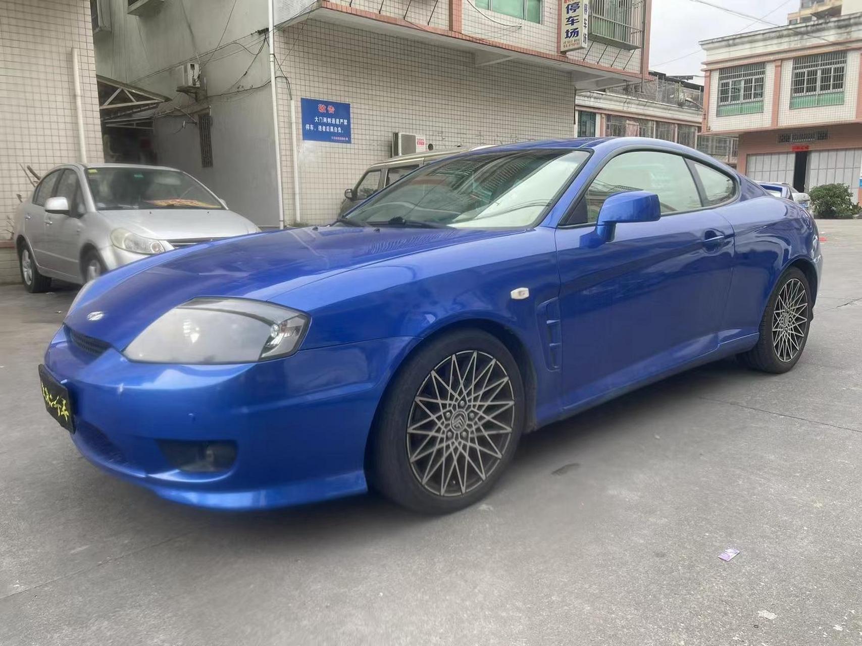 06年现代酷派v6发动机轿跑,车况漂亮,无事故,备胎末落地,年审明年4