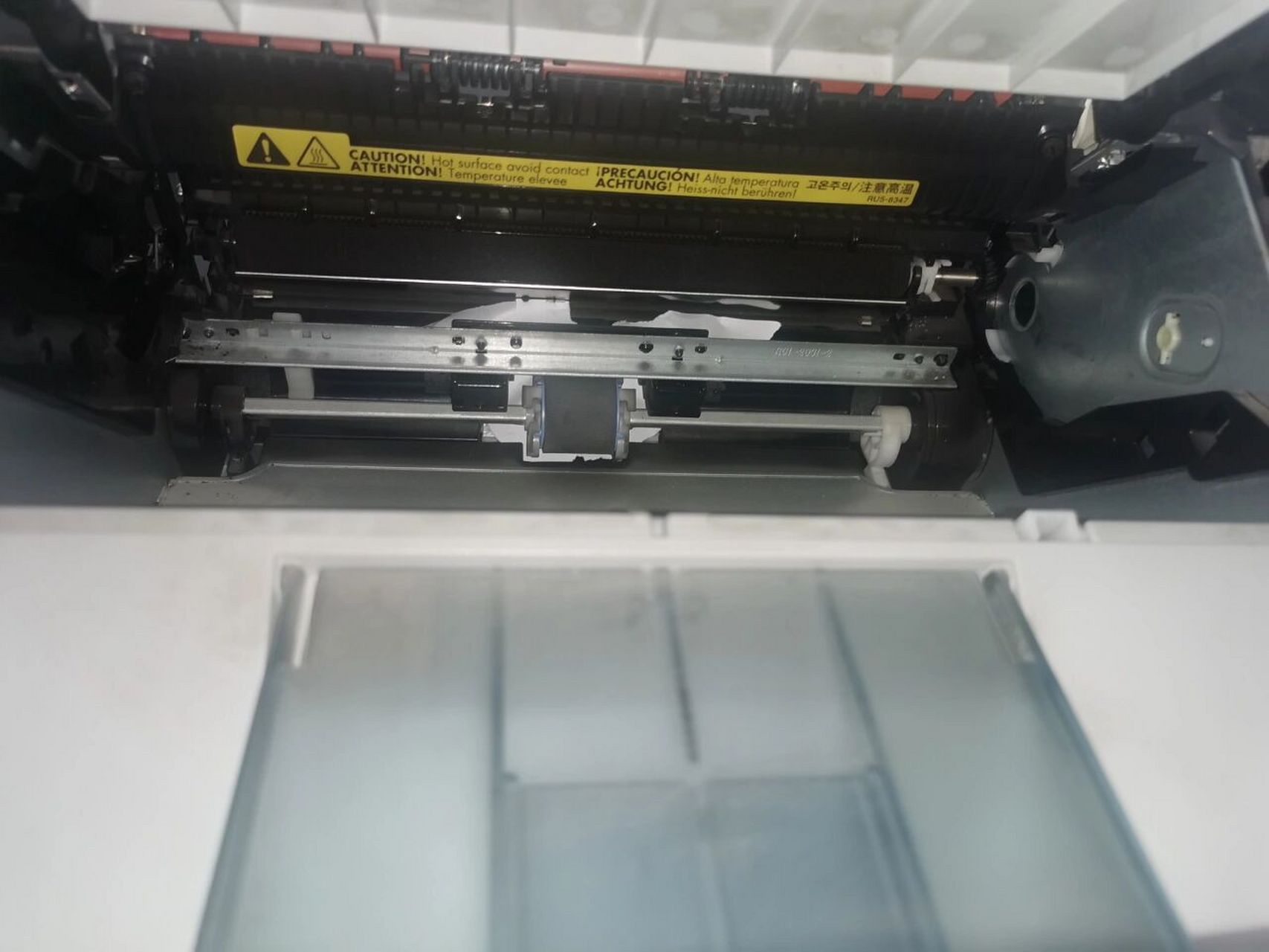 打印机卡纸了怎么办呀 hp laser jet m1005 mfp打印机卡纸卡成这样是