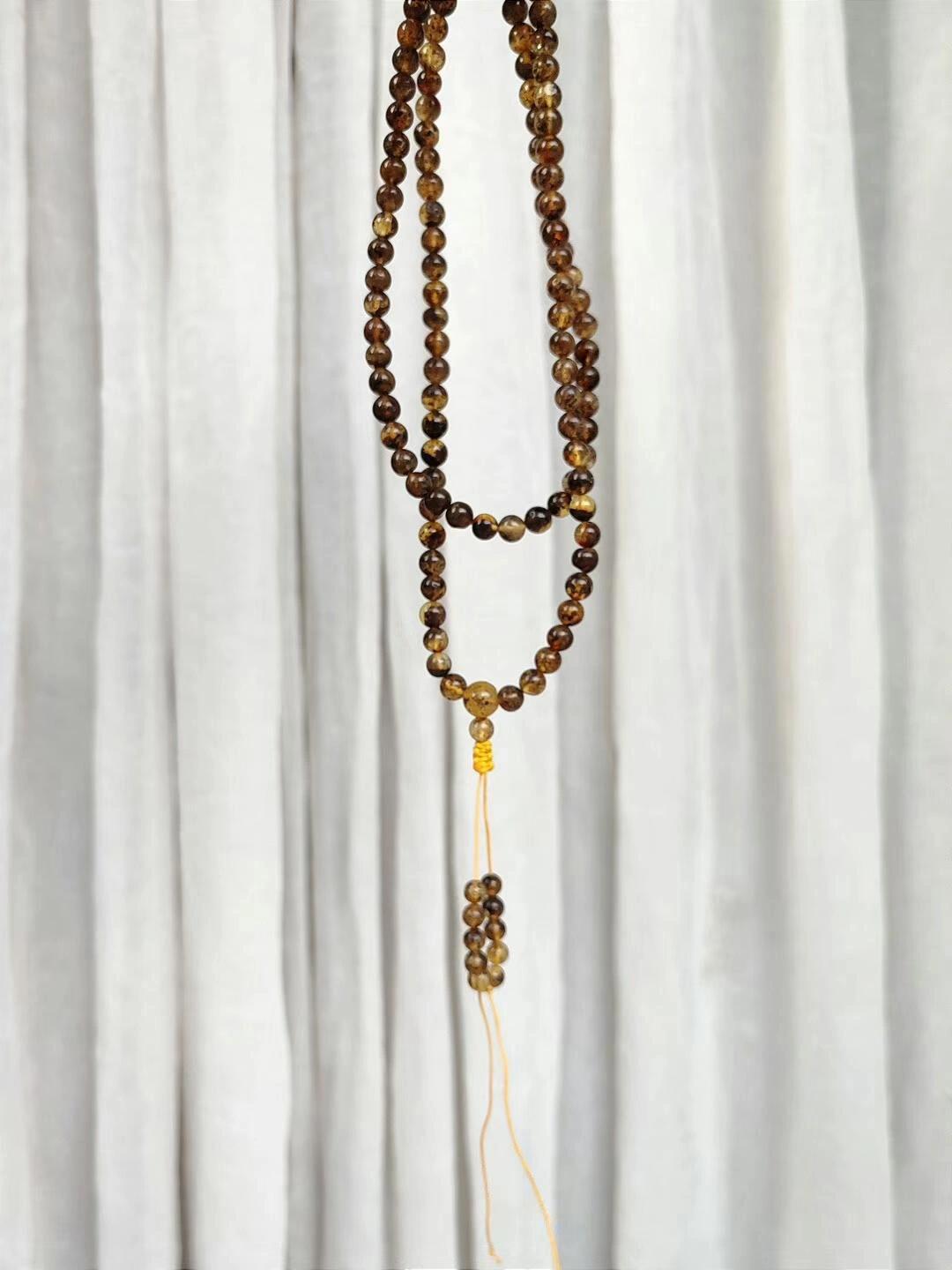 天然植物珀108多圈手串,长短可调节.上手效果非常酷.