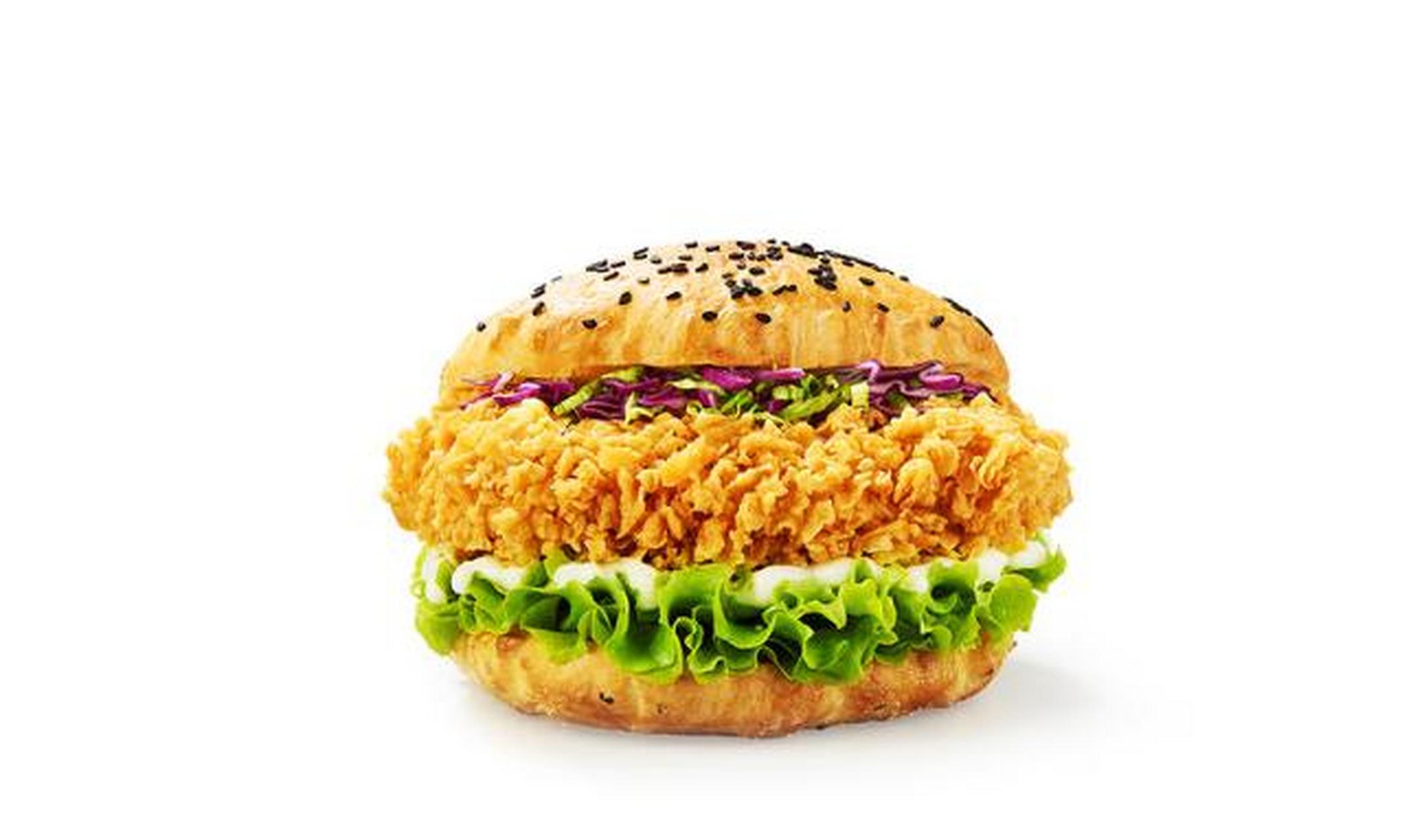 香辣鸡腿中国汉堡以其独特的香辣美味成为食客们心中的人气之王.