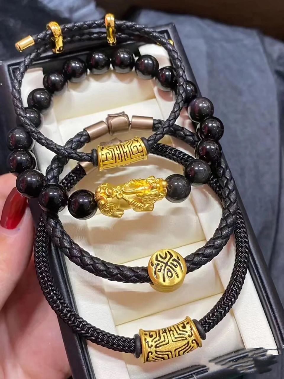 周大福转运珠 周大福饕餮图腾路路通复古黑金工艺 饕餮纹首先出现在