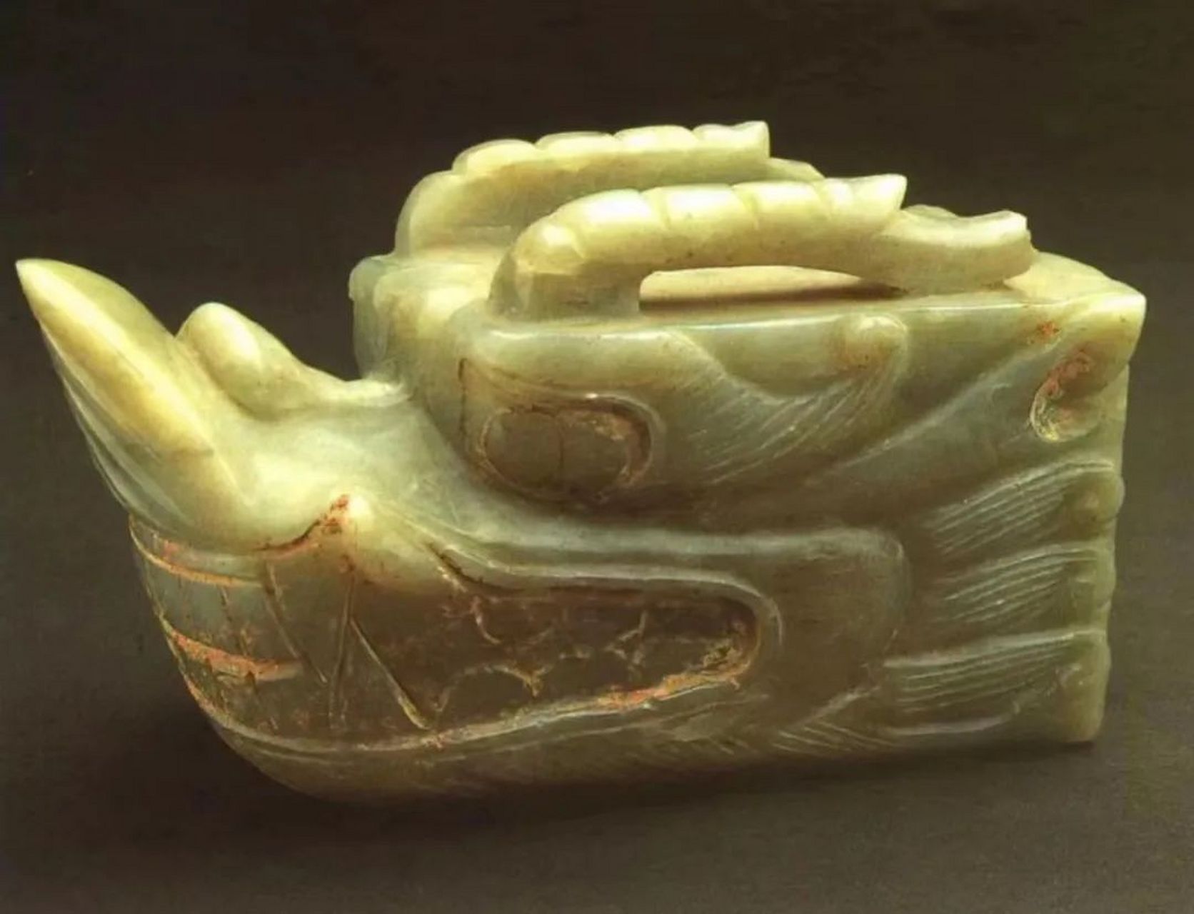 唐代圆雕动物形玉器 唐代圆雕动物形玉器题材丰富,多取材于生活中常见
