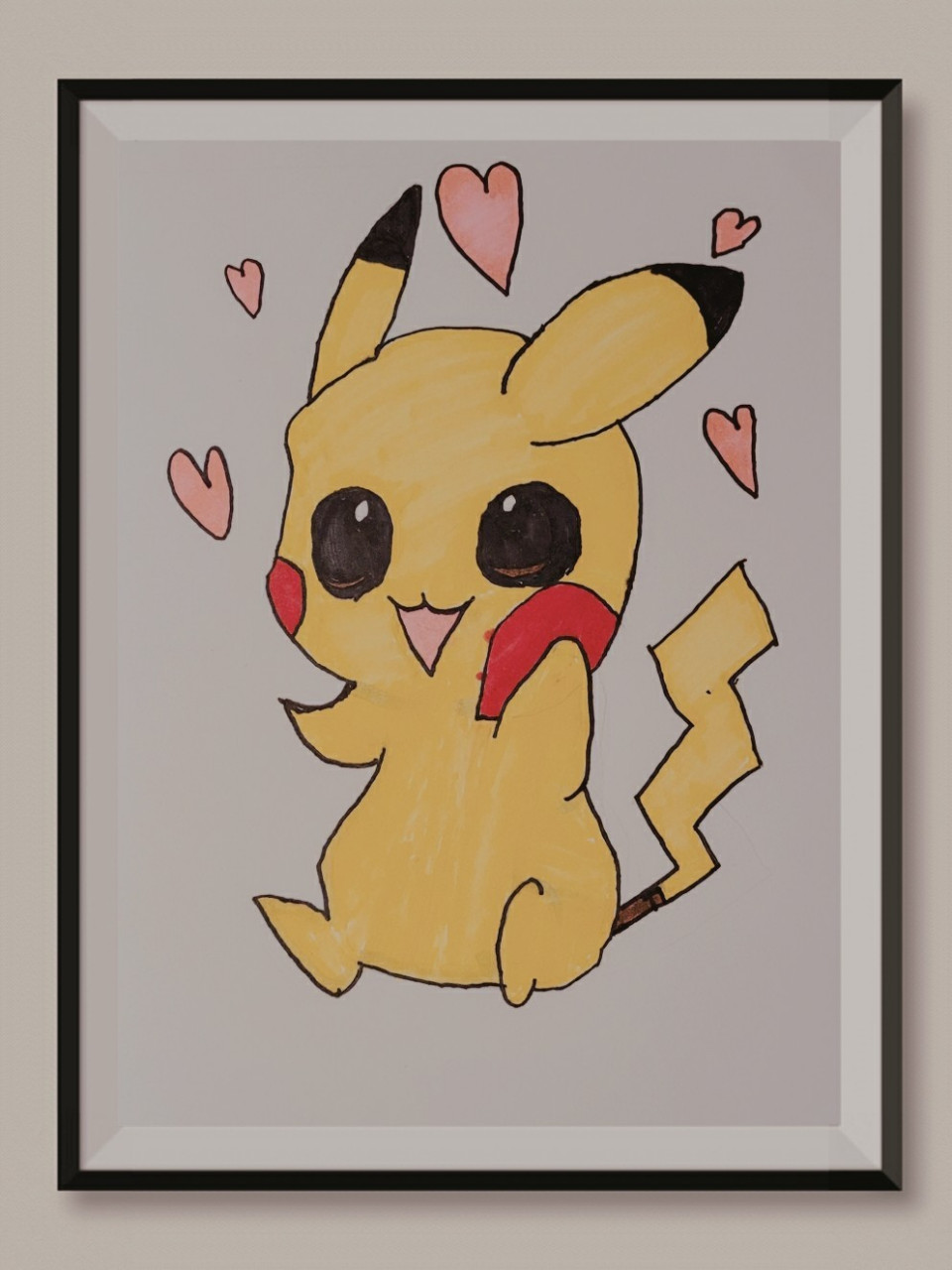 跟之前画的皮卡丘比又进步了,明显这一次的皮卡丘线条更清晰了,握笔