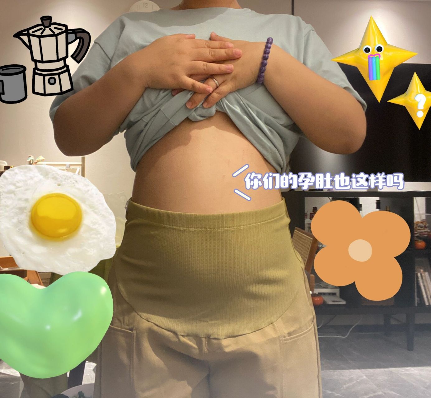 8周孕肚02你也一样显怀吗  怀孕已经8774天了,太显怀了,不科学不