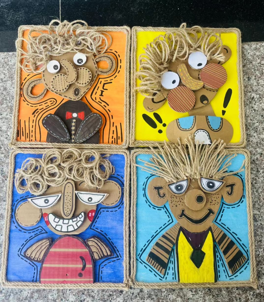 纸板废物利用幼儿园环创 工具:纸箱,麻绳,马克笔,剪刀,胶水.