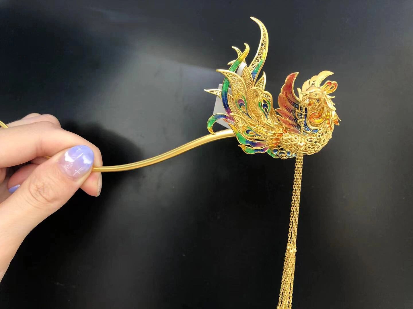 足金凤钗 黄金凤钗的寓意为吉祥,富贵,爱情.