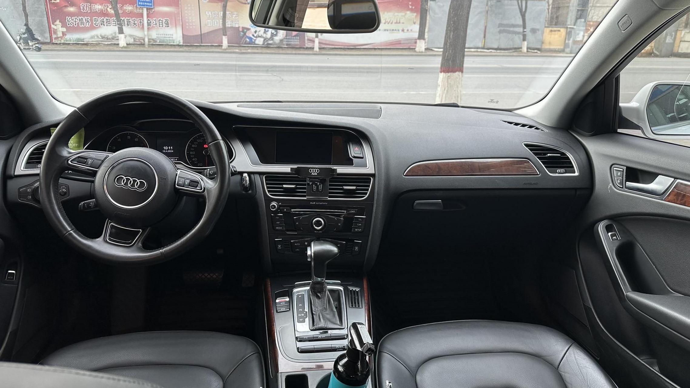 最新到家12年13款奥迪a4l 十万公里保实表 新车指导价32.