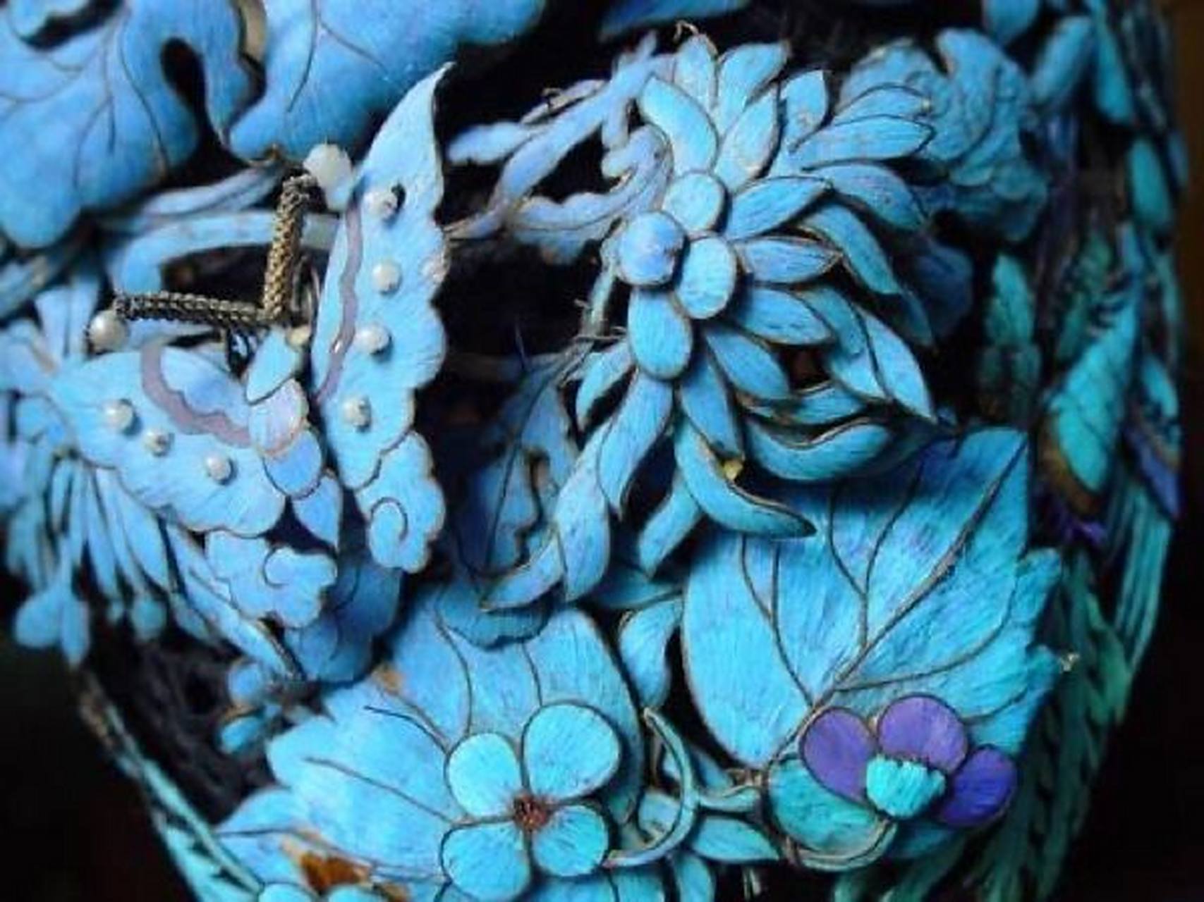 点翠工艺是中国一项传统的金银首饰制作工艺 , 古时候用翠鸟背部晾鲻