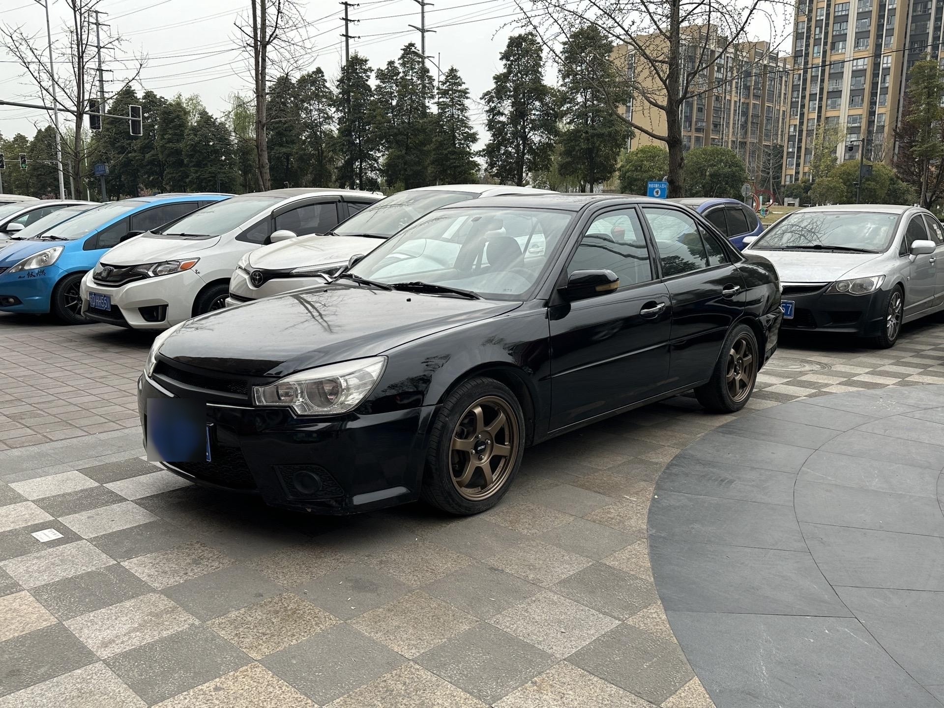 拿下12年菱悦v3 4g15m发动机 安全行驶11万公里 升级轮毂避震赛车方向