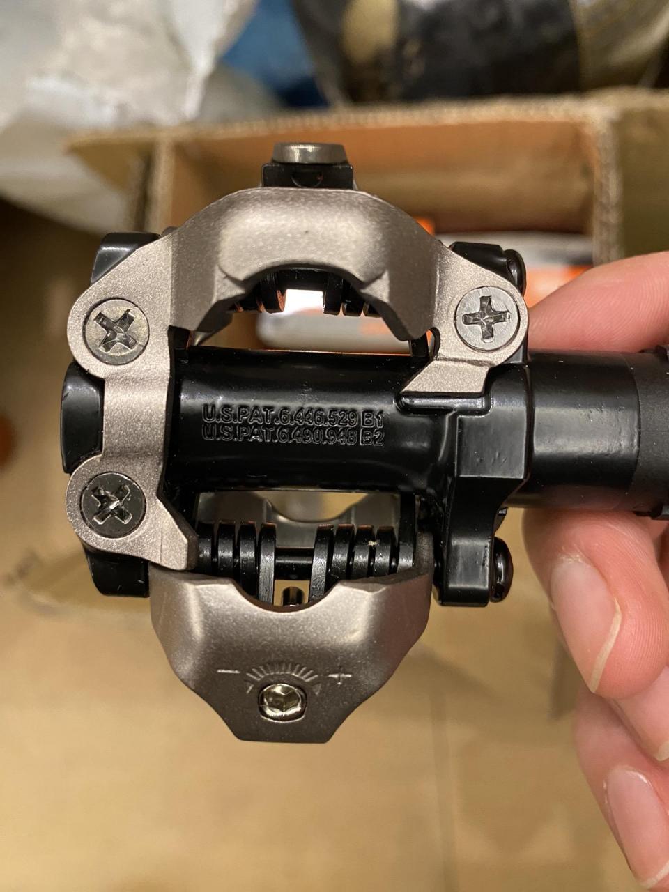 懂的兄弟帮忙看下真假.刚买的禧玛诺山地锁踏m520