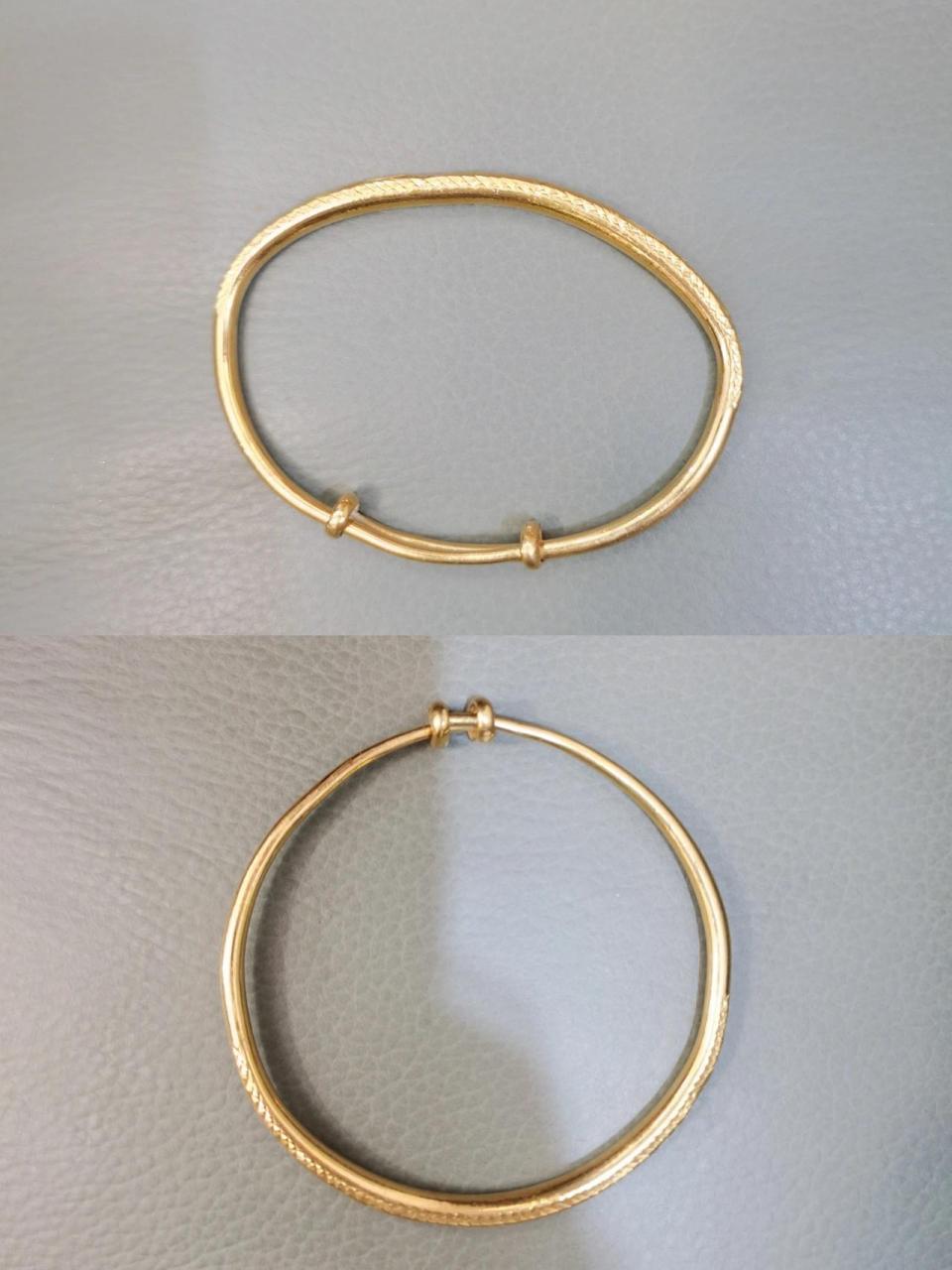 金手镯复原术~ 准备一个变形了的实心手镯 准备工具:圆锥木桶,橡皮锤