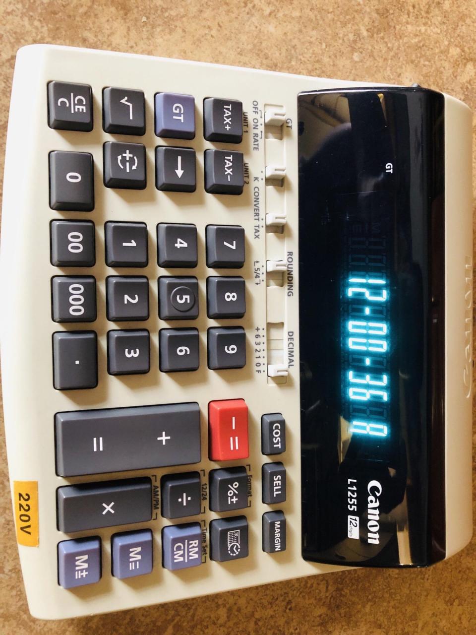 帮朋友改装一台佳能计算器,vfd材质荧光显示,可220v市电交流通电输入