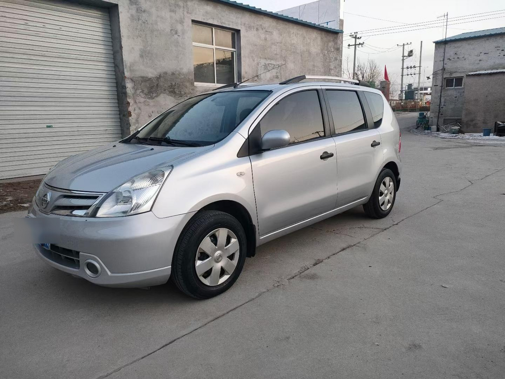 11年日产骊威,1.6手动,全车原版原漆,纯一手车,实表九万公里.