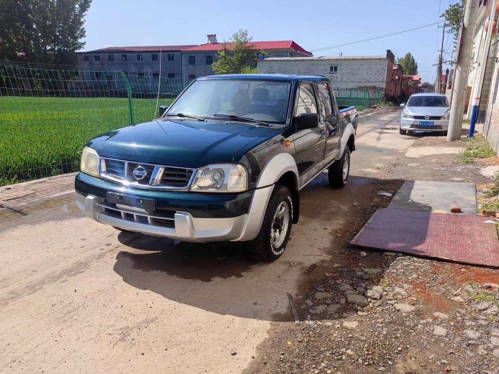 极品09年尼桑np300汽油四驱皮卡,实表6万多公里,新款k24白金电喷