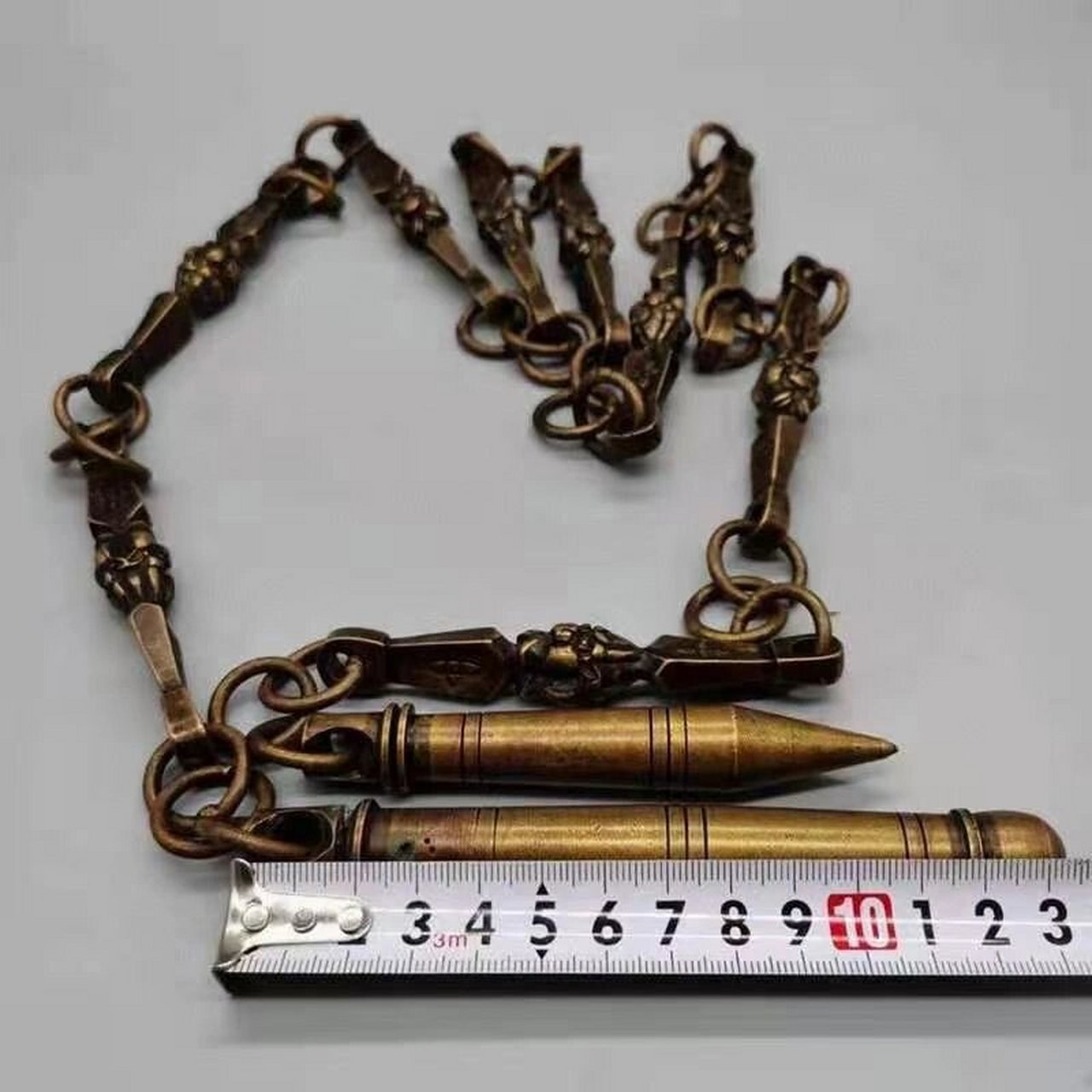 九节鞭黄铜实心鞭子实心古代兵器实心铜浮雕 九节鞭黄铜实心鞭子实心