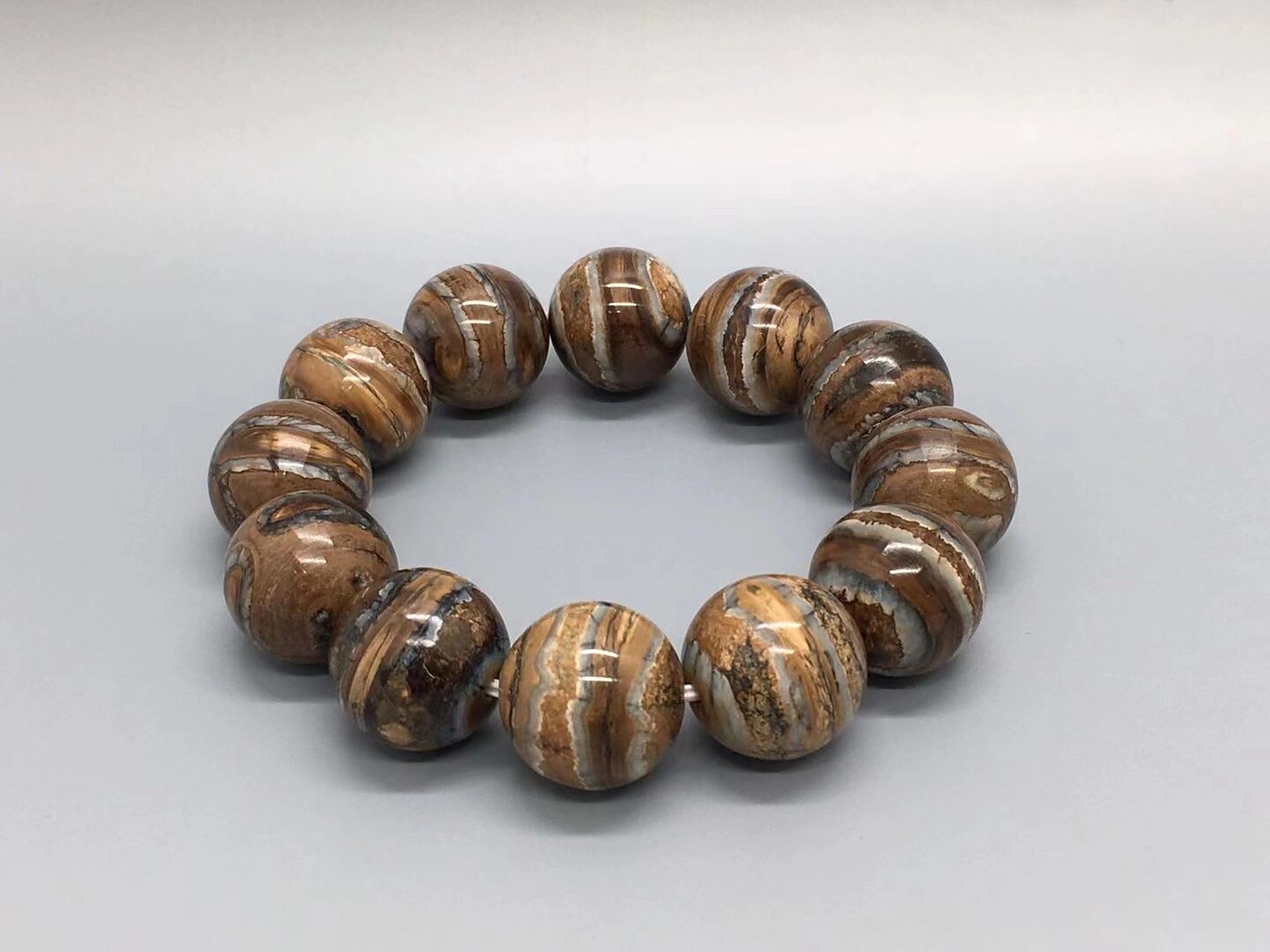 臼齿手串猛犸象牙顶级20mm臼齿手串,采用鹤天工艺,材料要求高,新颖