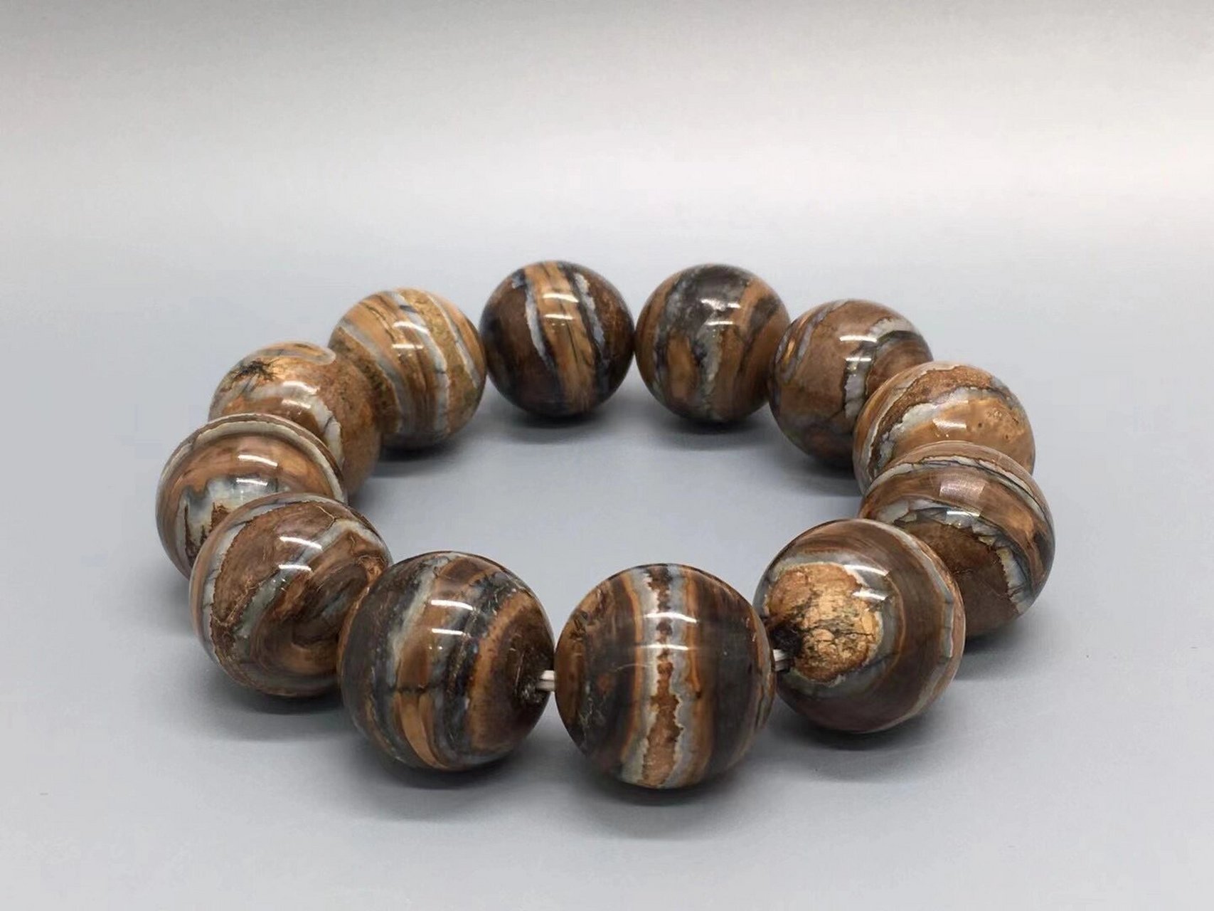 臼齿手串猛犸象牙顶级20mm臼齿手串,采用鹤天工艺,材料要求高,新颖