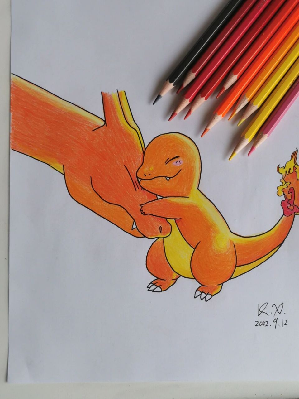 宝可梦彩铅手绘,喷火龙和小火龙 之前画的线稿,现在彩铅上色了.