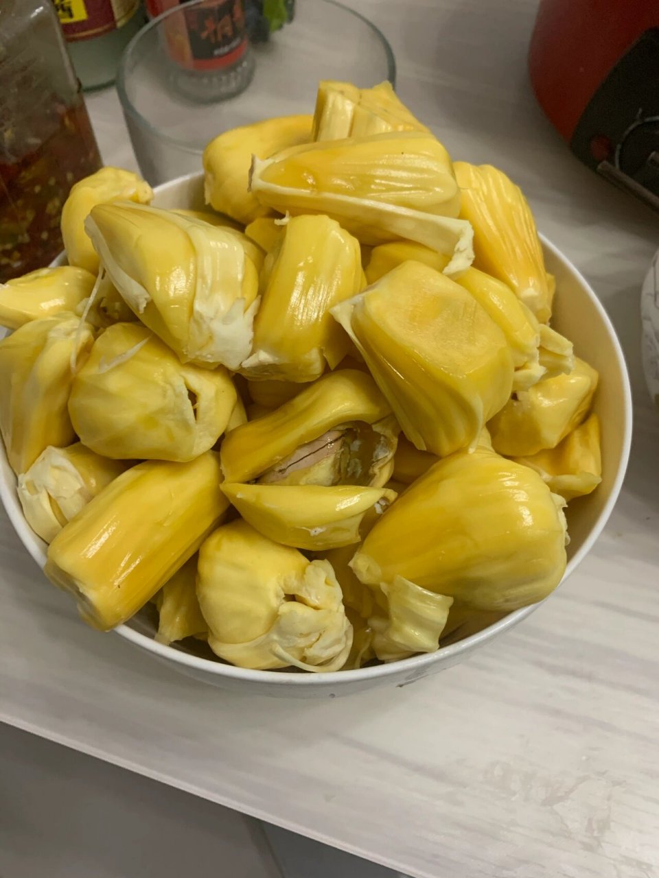 红肉和黄肉菠萝蜜 两个都是半个菠萝蜜剥出来的 都是带皮8斤 图1红肉