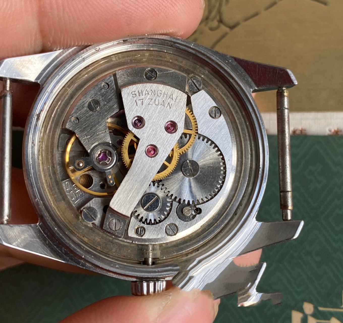 老上海手表ss1型机芯简介 ss1型机芯是上海581/611机芯的升级版 上海